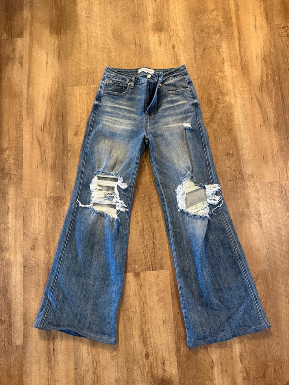 High-Rise Distressed Flare Jeans in Blue